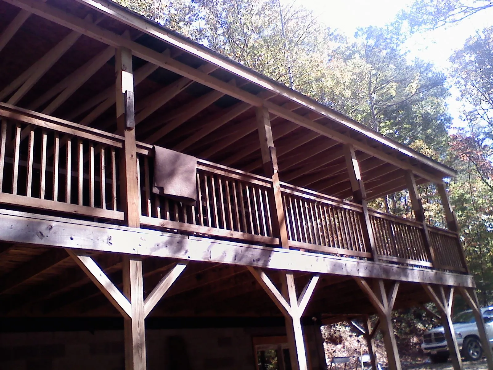 Timber framing under a new elevated porch and deck — Roof Leak Repair in Lusby by Roofing Brothers